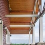 front porch on nice red house