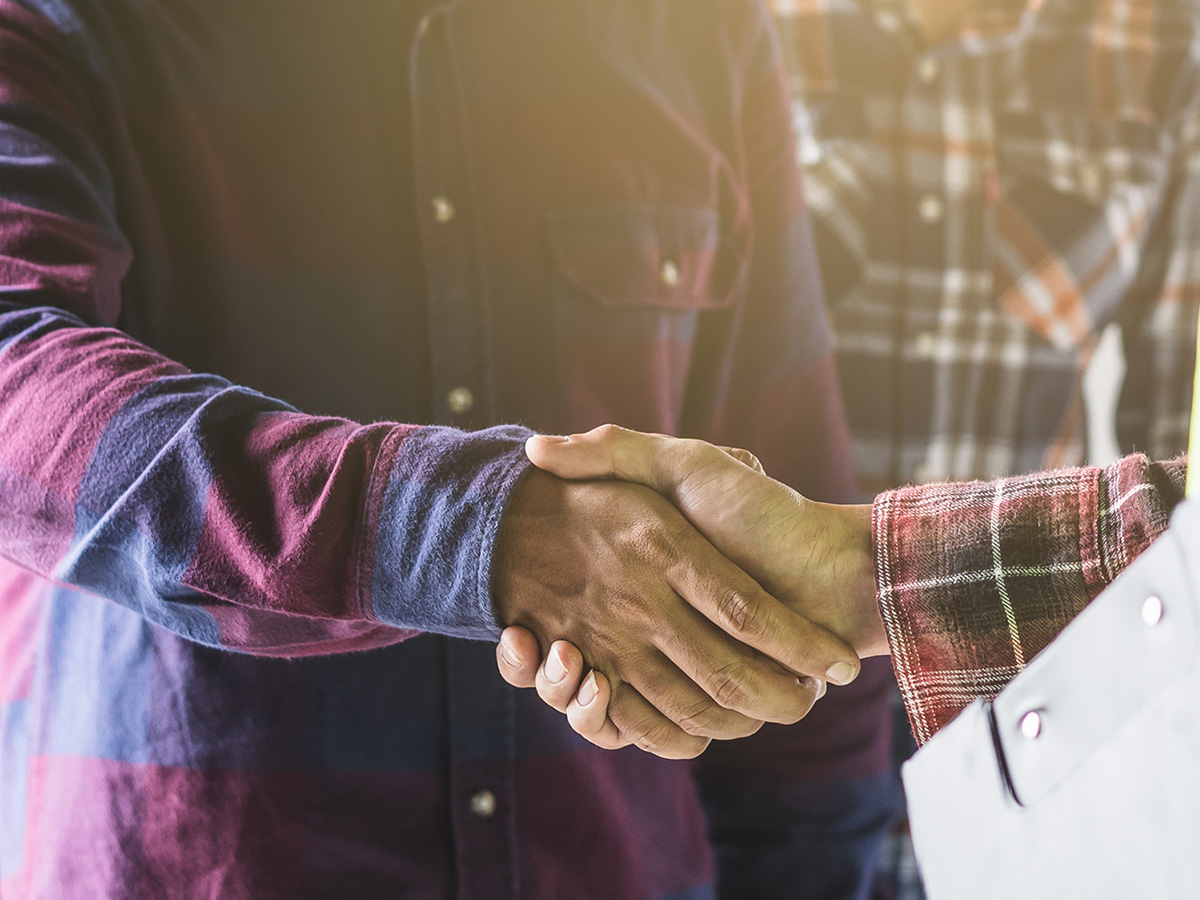Shaking hands with a contractor