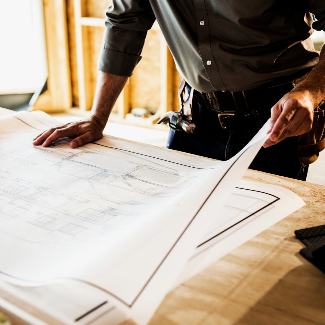 Contractor looking at build plans