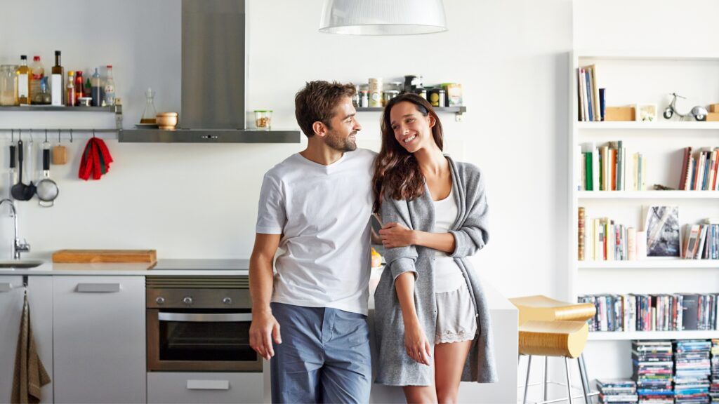 Happy couple enjoying their new home
