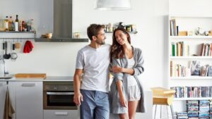 Happy couple enjoying their new home