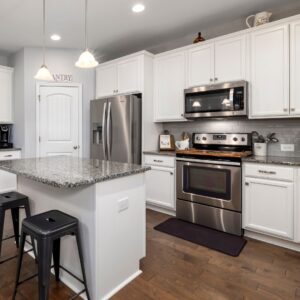 kitchen with white cabinets and stainless steel appliances